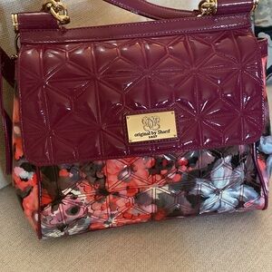 Sharif handbag  # 1827 in plum patent leather with goldtone hardware.